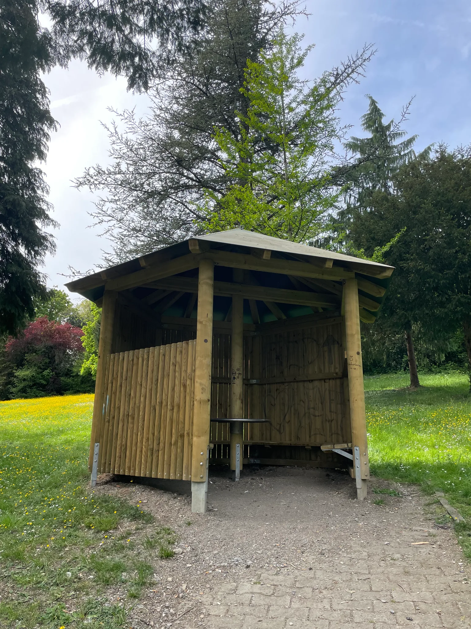 Bench: a hut in a quiet park
